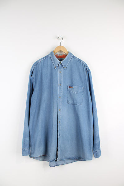 Vintage Marlboro button up shirt in light blue denim, has a pocket on the chest with embroidered logo.