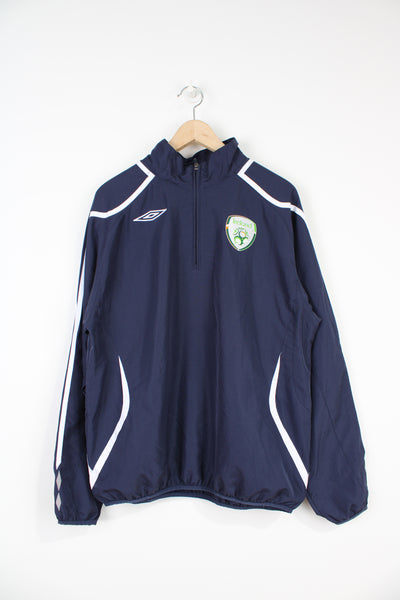 Ireland F.C navy blue 1/4 zip tracksuit top by Umbro with embroidered badges on the chest
