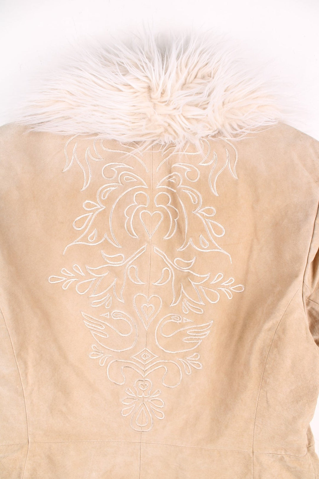 Vintage Y2K Leather Afghan Coat in a tan colourway. Clasp closure, has side pockets, faux fur trim, and has floral patterns embroidered on the down the sleeves and on the back.