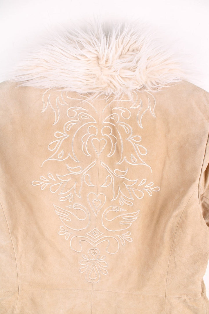 Vintage Y2K Leather Afghan Coat in a tan colourway. Clasp closure, has side pockets, faux fur trim, and has floral patterns embroidered on the down the sleeves and on the back.