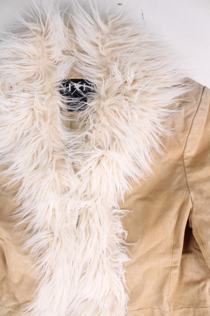 Vintage Y2K Leather Afghan Coat in a tan colourway. Clasp closure, has side pockets, faux fur trim, and has floral patterns embroidered on the down the sleeves and on the back.