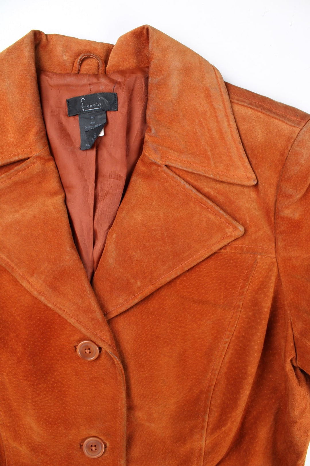 Vintage Suede Trench Coat in a brown colourway. Buttons up and has side pockets, a large collar, and belt feature.