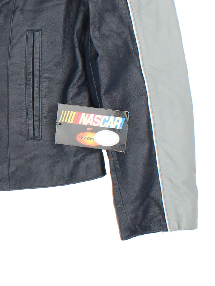 Vintage Leather Nascar Jacket in a navy blue and grey colourway. Zips up and has side pockets, and has Jimmmie Johnson number 48 embroidered on the front.