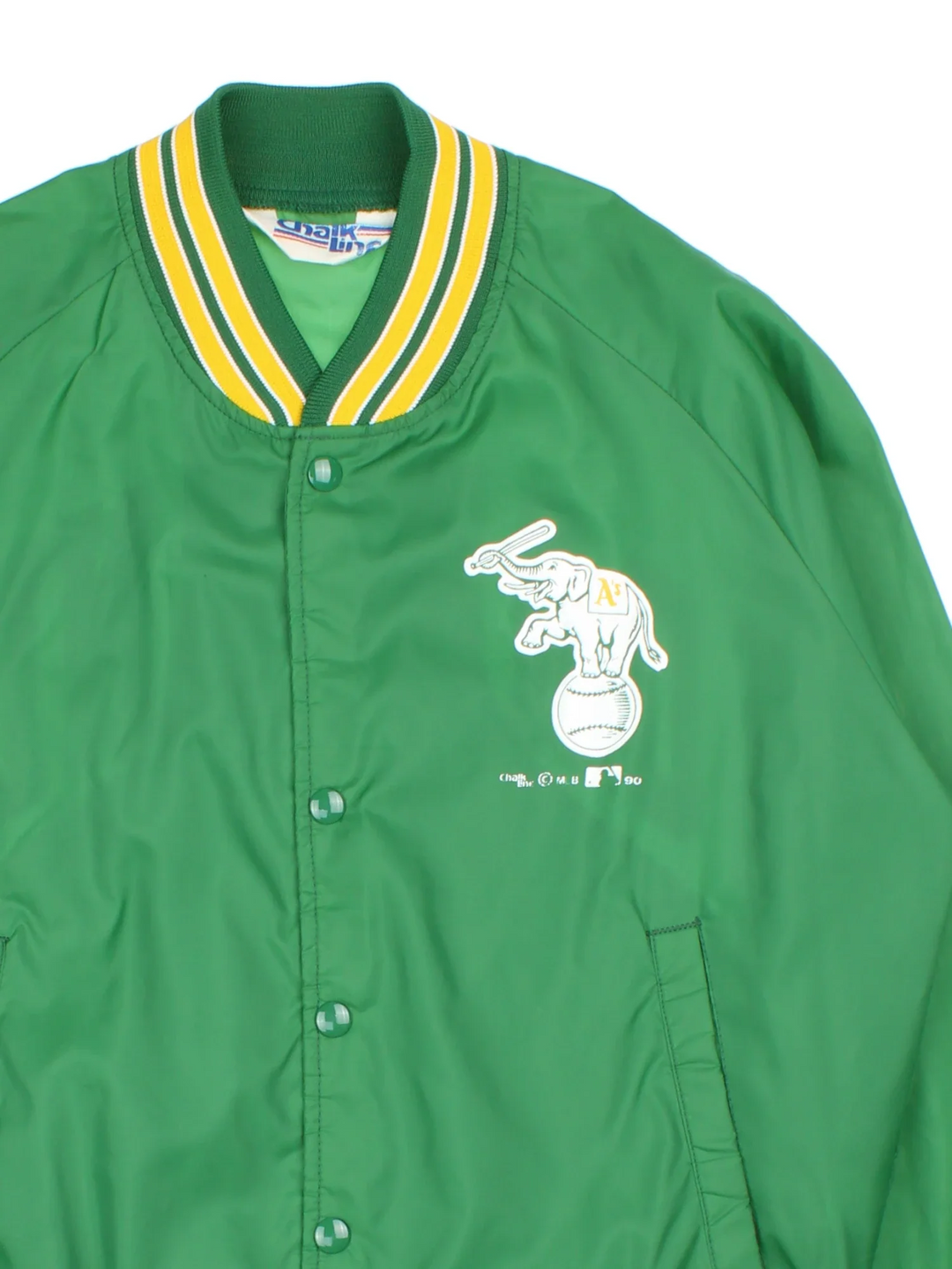 Vintage 1989 Oakland Athletics Chalk Line MLB Varsity Jacket in a green colourway. Zips up and has side pockets, and the team logo / spell out printed on the front and back.
