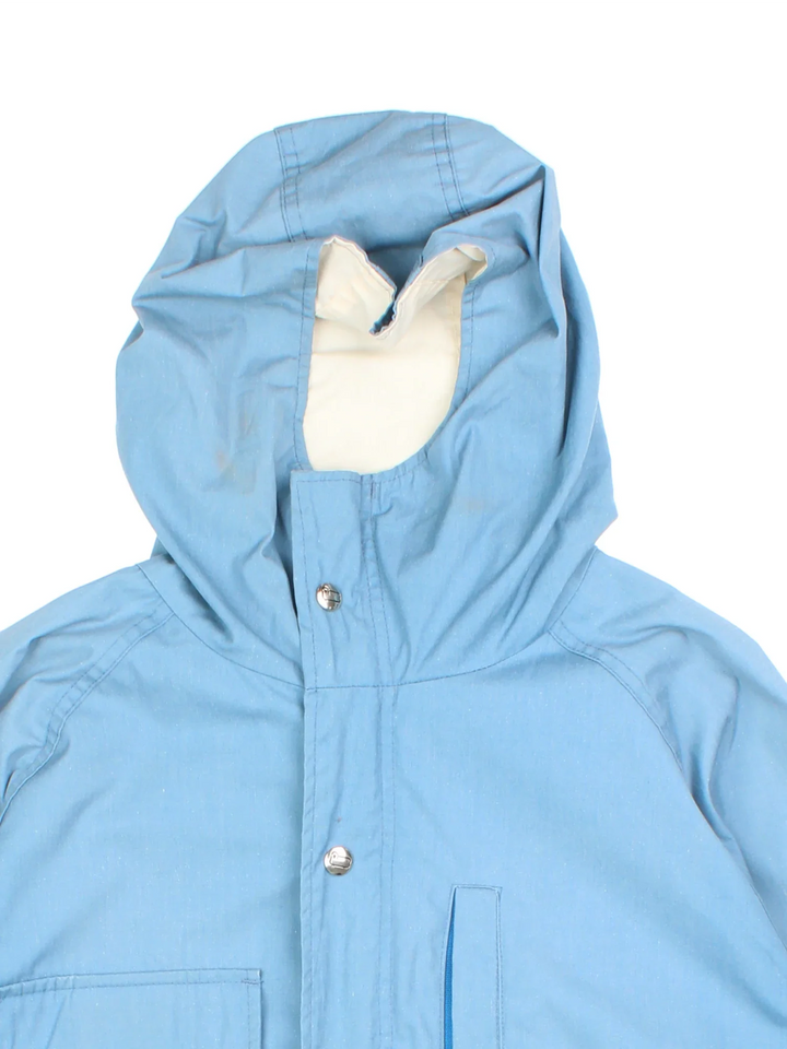 Vintage Woolrich Parka Jacket in a blue colourway. Zips up, hooded and has multiple pockets.
