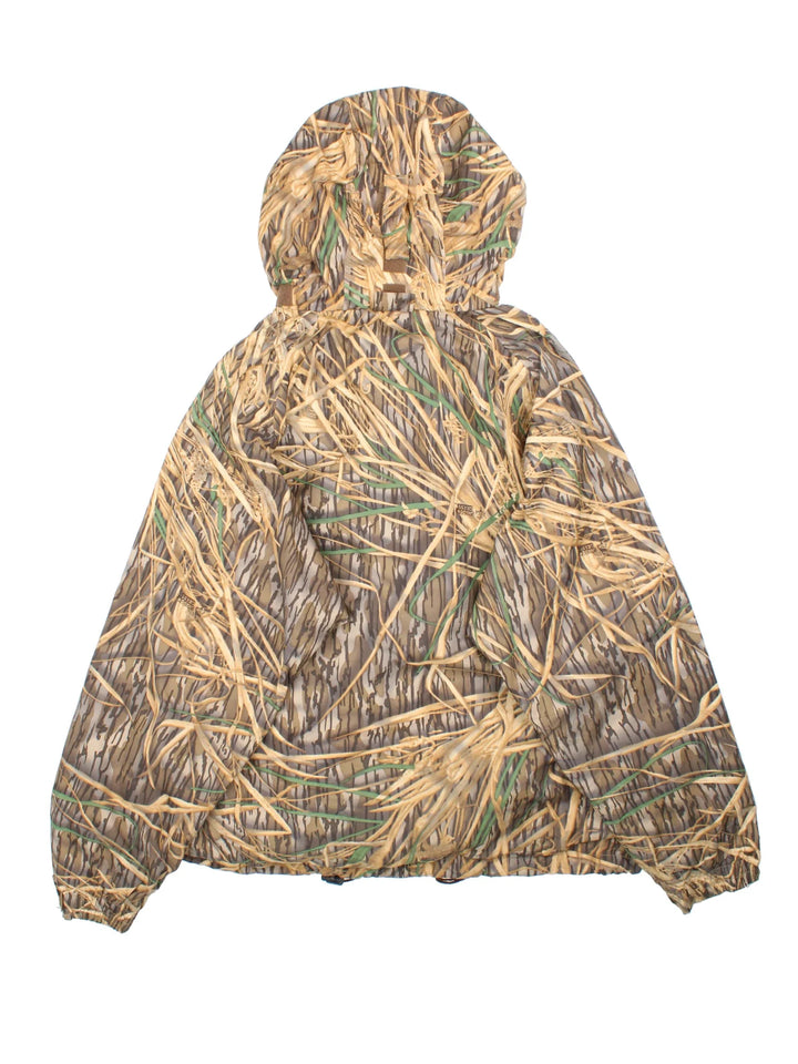 Vintage Columbia Real Tree Camo Jacket in a brown and green colourway. Zips up and has multiple pockets, hooded, and has the logo embroidered on the front.