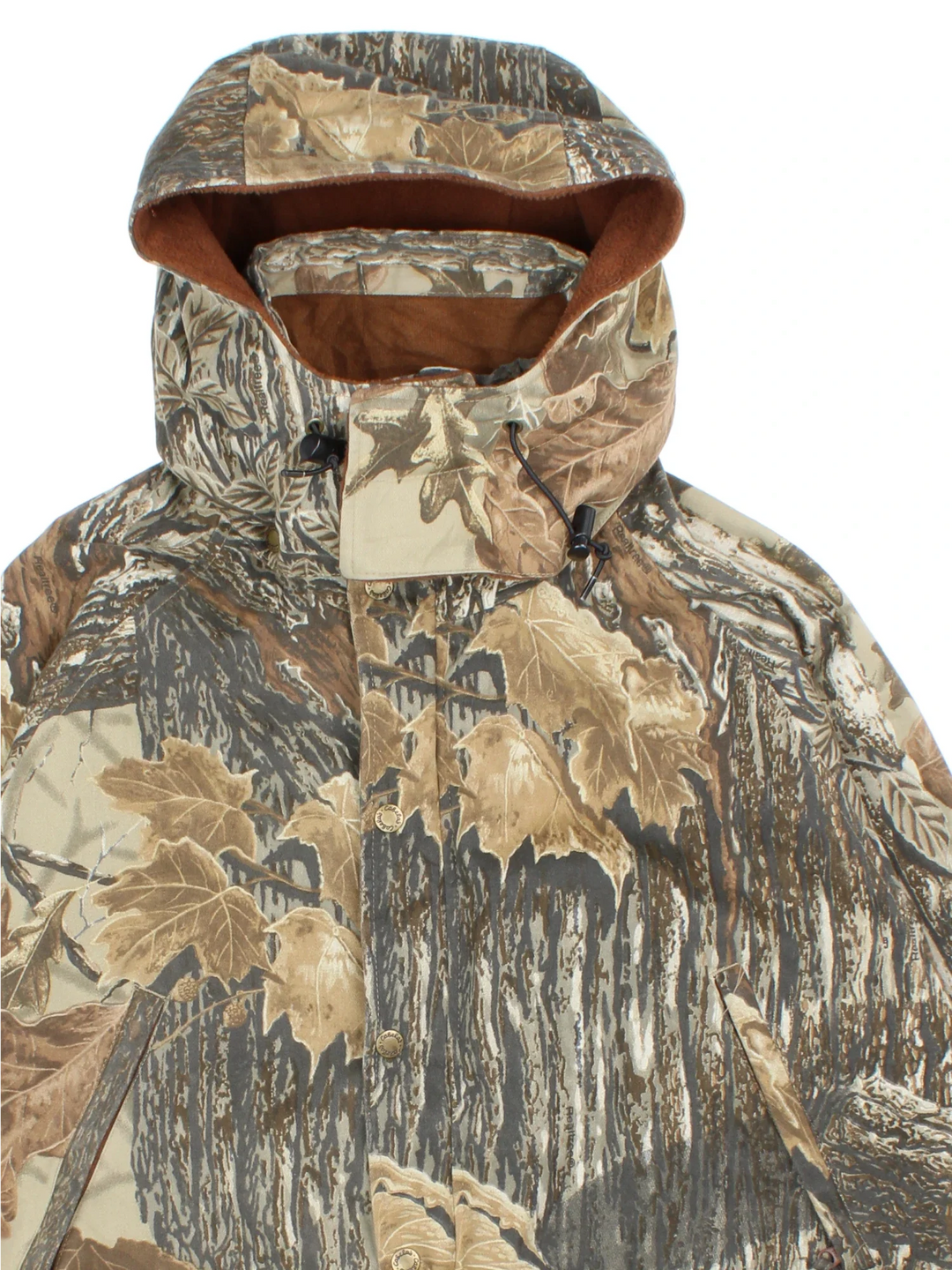 Vintage Cabelas Real Tree Camo Jacket in a green and brown colourway. Zips and buttons up, has multiple pockets, detachable hood, and has the logo embroidered on the front pocket.