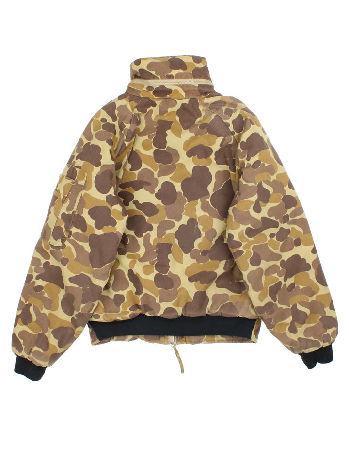 Vintage Gamehide Camo Hunting Jacket in a brown and green colourway. Zips up and has multiple utility pockets, insulated with a quilted lining and has a hidden hood.