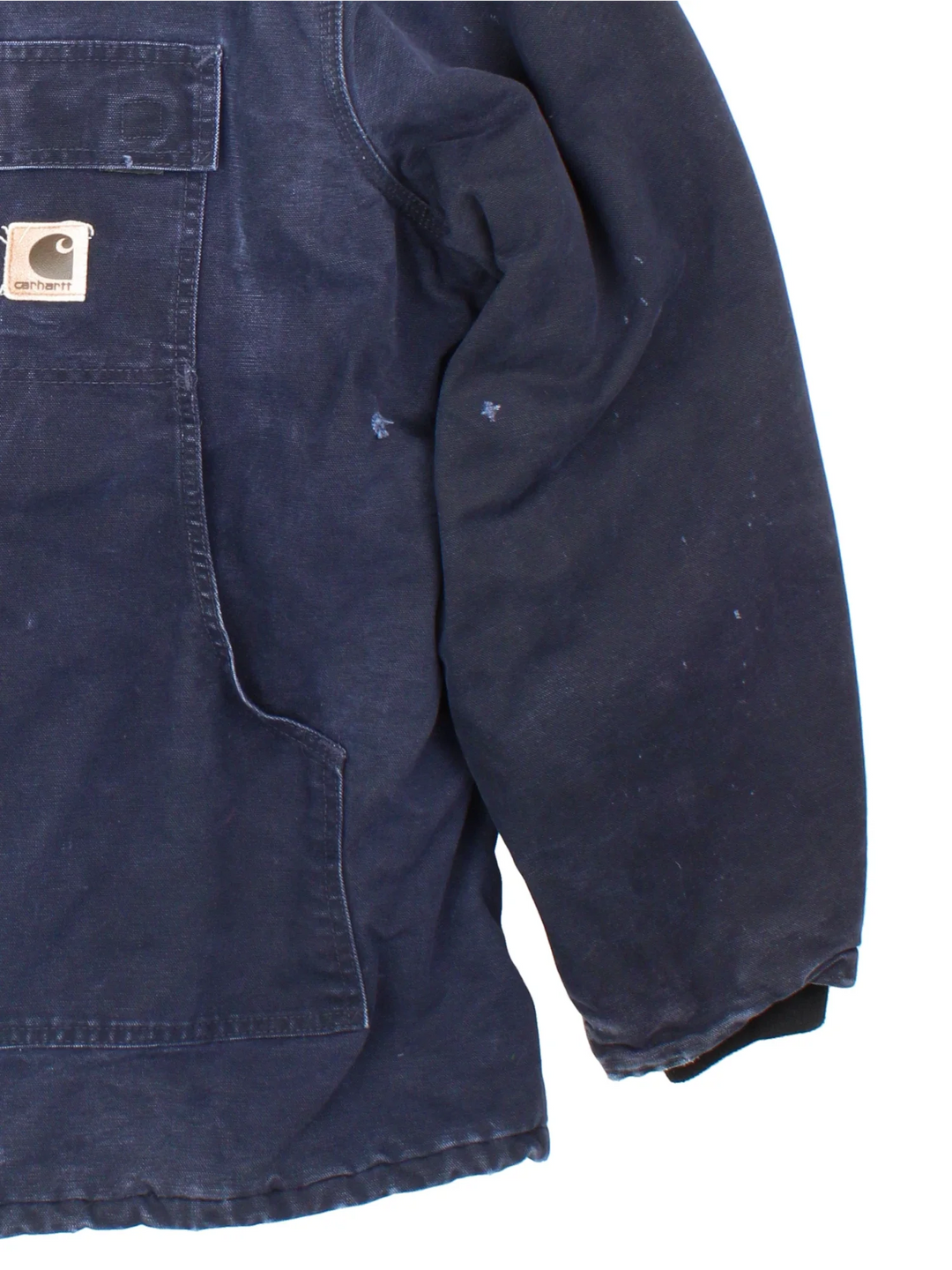 Vintage Carhartt Arctic Jacket in a navy blue colourway with a brown corduroy collar. Zips up and has multiple pockets, insulated with a quilted lining, and has the logo embroidered on the front.