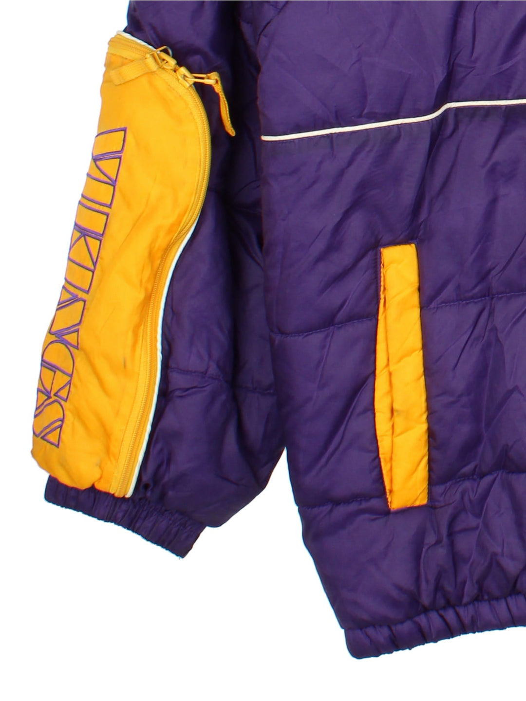 Vintage Minnesota Vikings Reebok NFL Puffer Jacket in a purple and yellow colourway. Zips up and has multiple pockets, insulated lining, and has the logos embroidered on the front.
