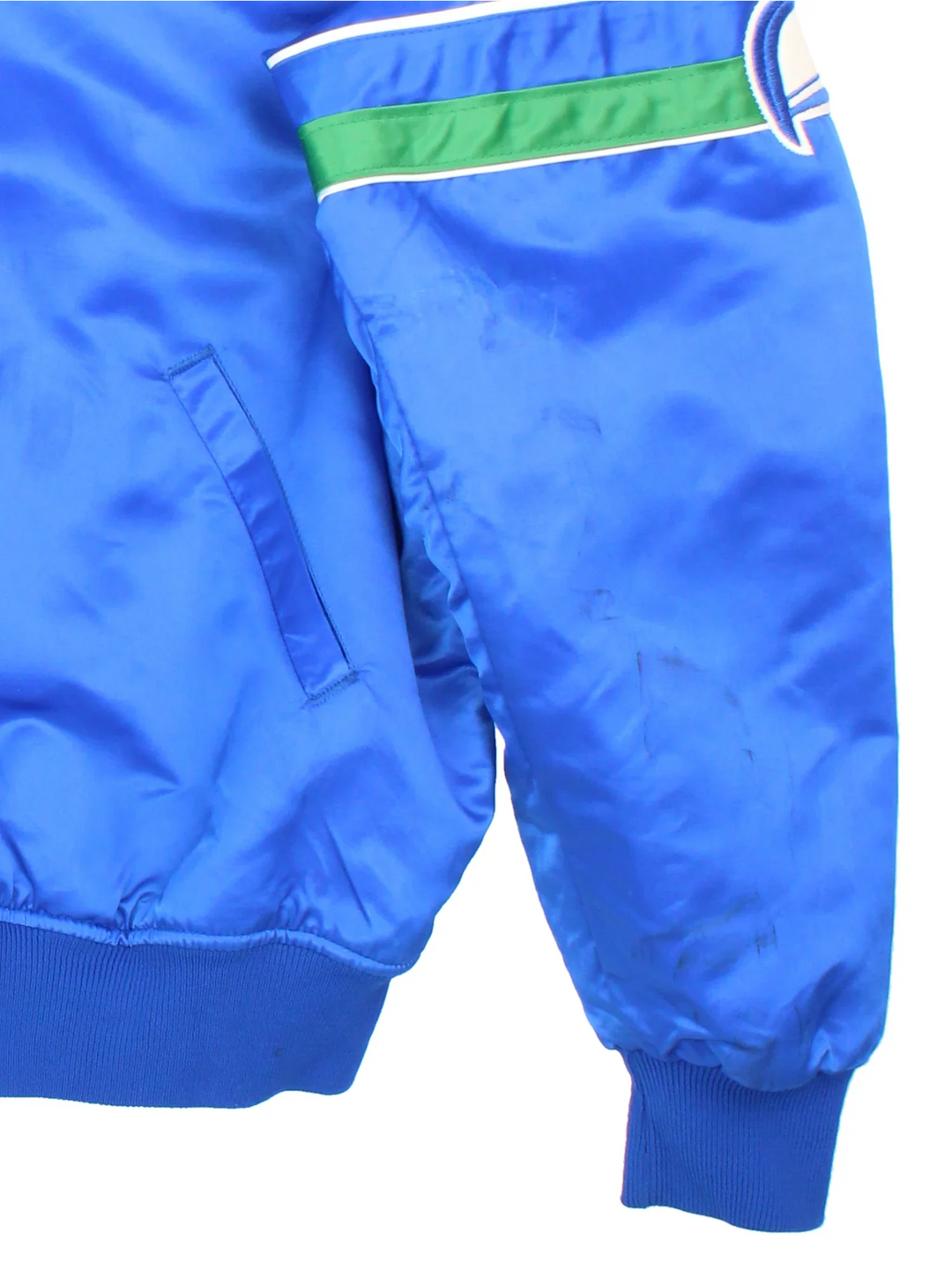 90's Seattle Seahawks NFL Starter Varsity Jacket in a blue colourway. Buttons up and has side pockets, insultaed with a quilted lining, has the team detailing on the sleeves and small logo on the front.