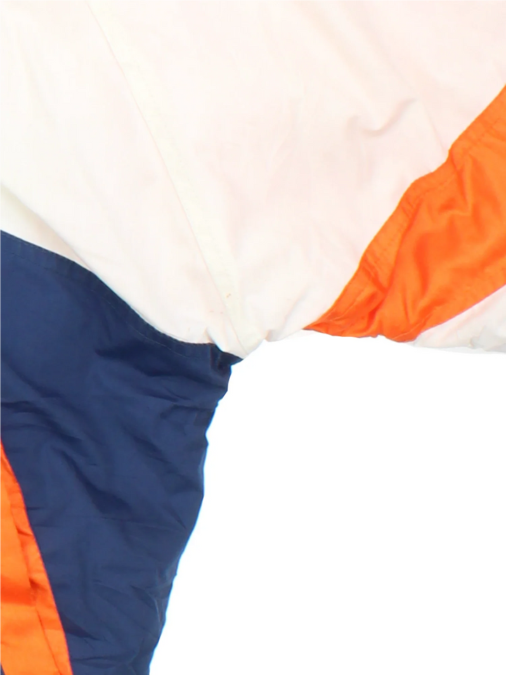 90's Chicago Bears Pro Player Jacket in a white and blue colourway with orange detailing. Full zip up and two pockets on the front with large team logo on the front and sleeves with larger logo and graphic across the back.