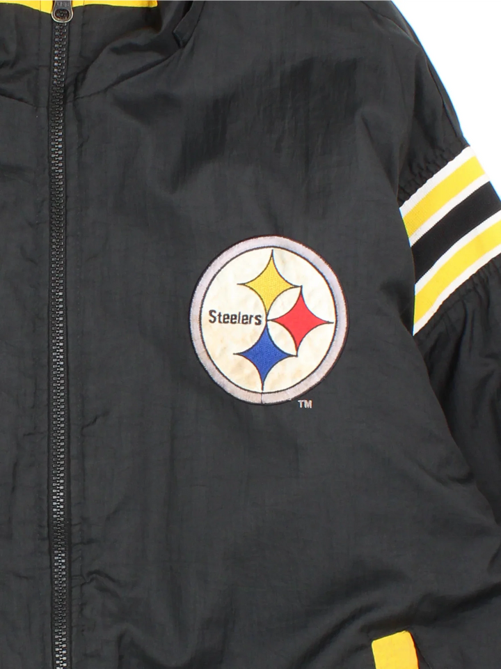 Pittsburgh Steelers NFL Pro Player Jacket in either a black or yellow reversible colourway options. Full zip with double pocket and classic steelers logo on the front and back.