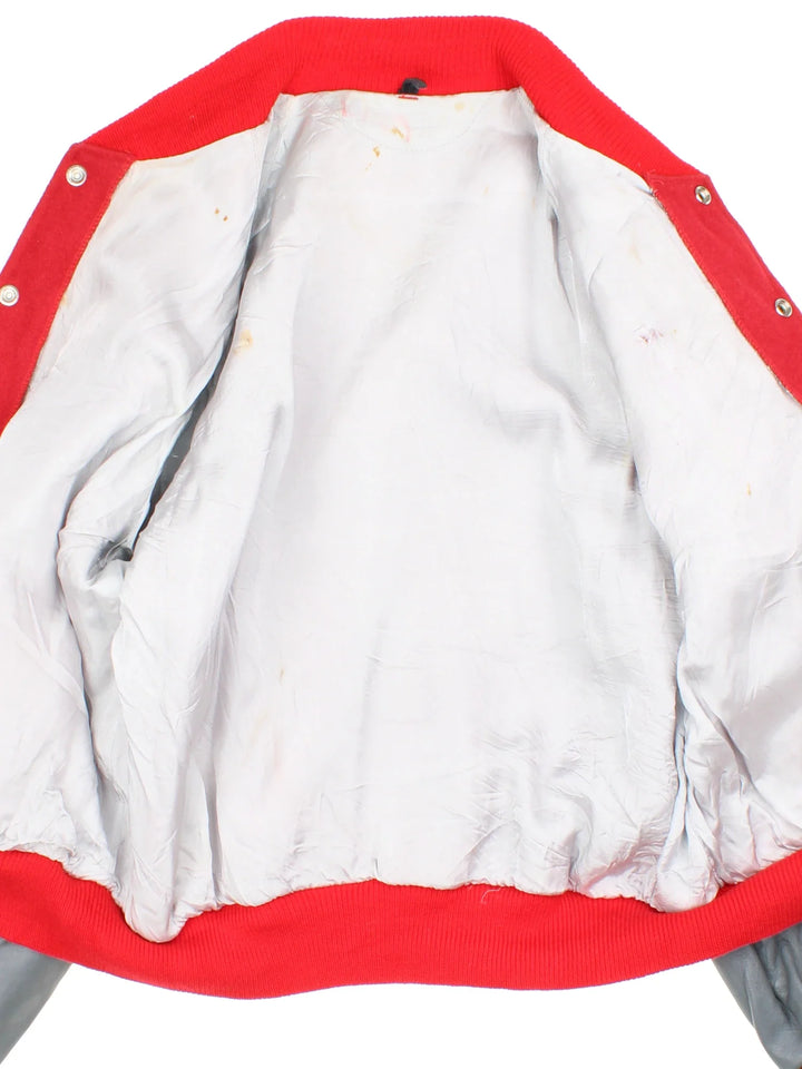 Vintage Varsity Letterman Jacket in a red colourway with grey sleeve panelling. Buttons up with side pockets and 'WL' lettering on the front.
