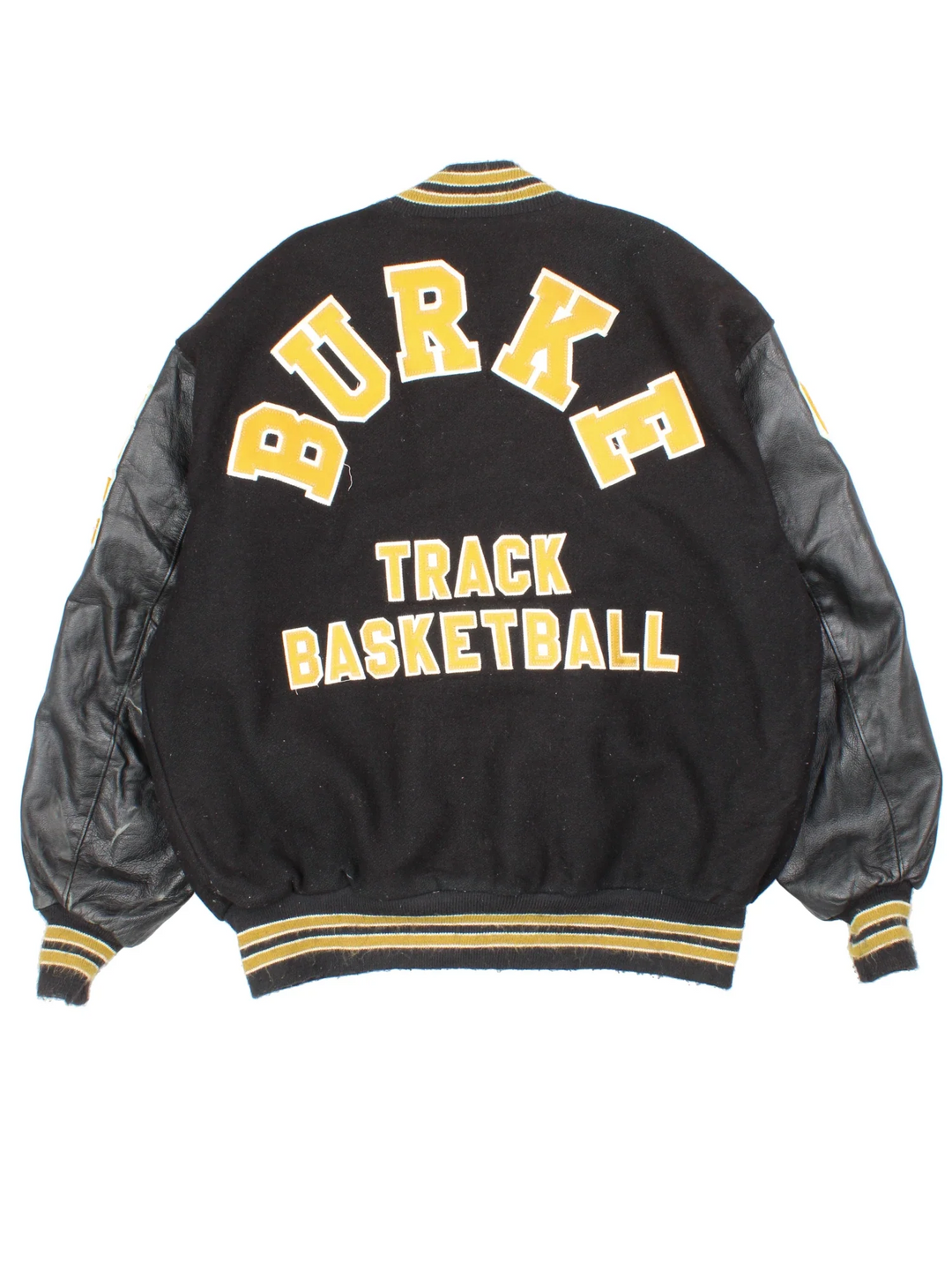 Vintage 'Omaha Burke' College Basketball Varsity Jacket in a black colourway with gold detailing. Classic varsity style with large lettering on the front and spell out on the back, buttons up with side pockets and leather sleeves.