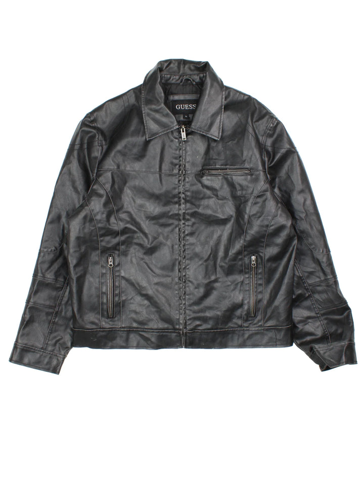 Guess Leather Jacket in a black colourway. Zip fastening with multiple zip pockets, fully lined.