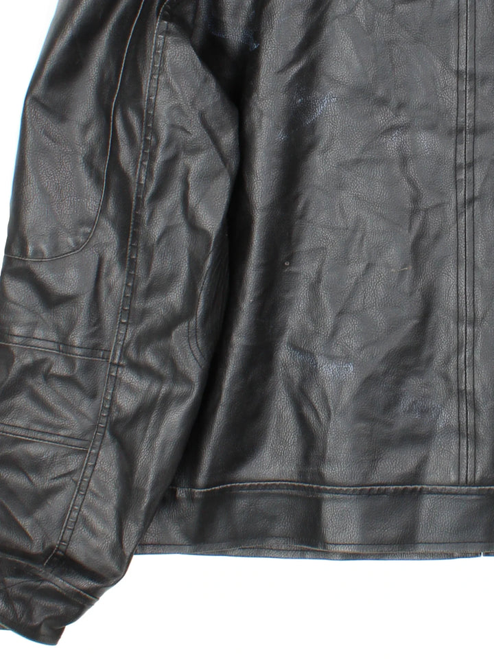 Guess Leather Jacket in a black colourway. Zip fastening with multiple zip pockets, fully lined.