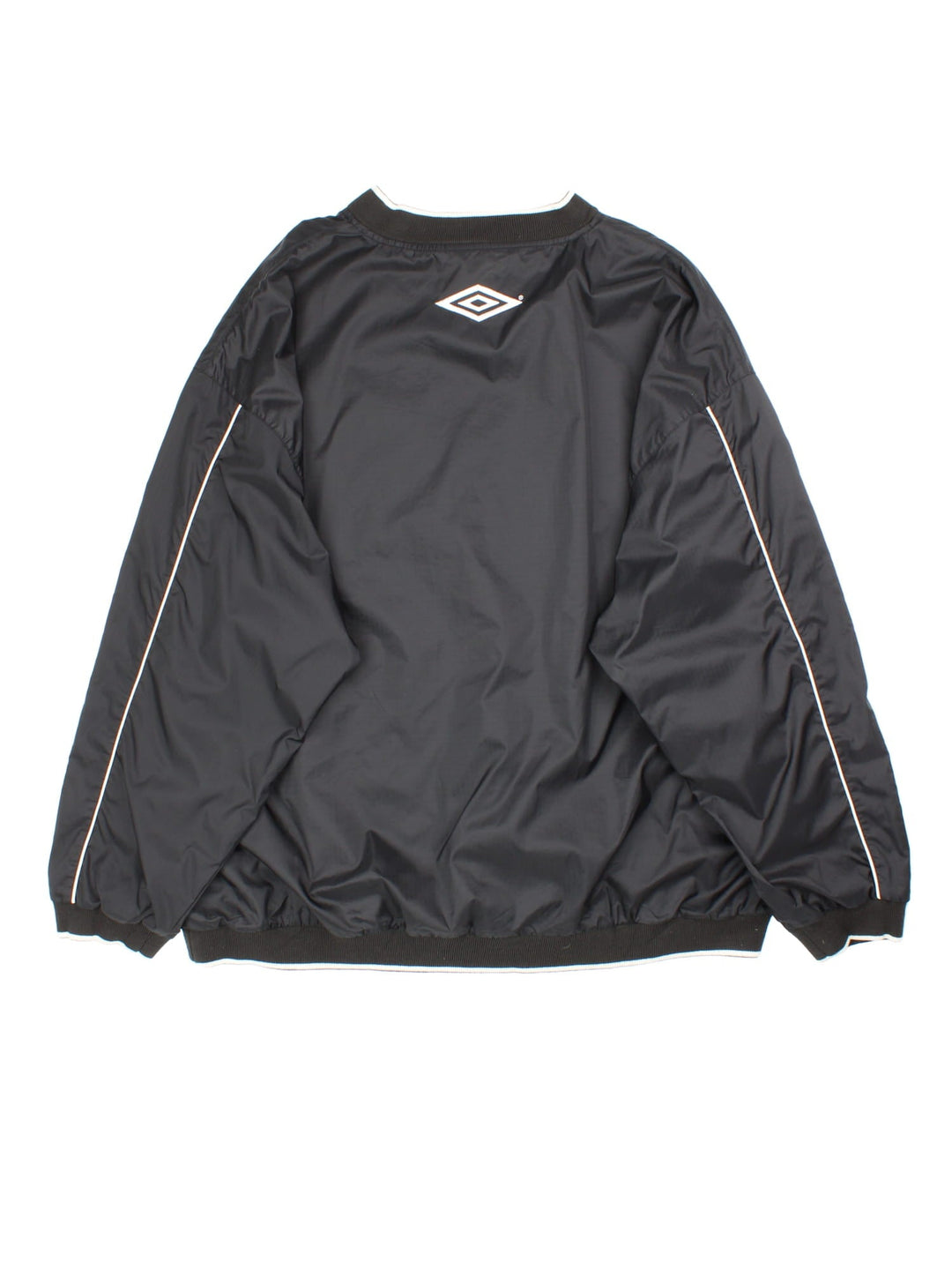 Vintage 90's Manchester United Umbro Drill Training Top in a black colourway. V neck collar and has side pockets, mesh lining, and has the logos embroidered on the front and back.
