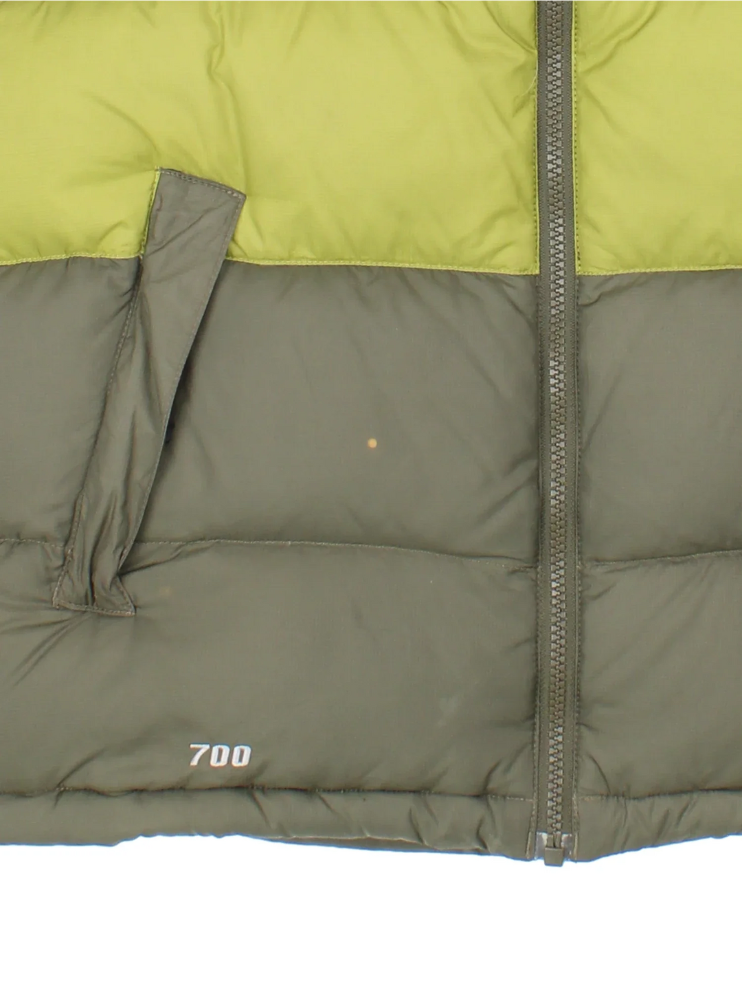 The North Face 700 Gilet in a green colourway with tonal stripe panelling, two pockets, full zip and small classic logo on the front.