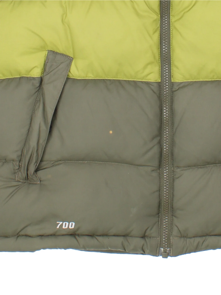 The North Face 700 Gilet in a green colourway with tonal stripe panelling, two pockets, full zip and small classic logo on the front.