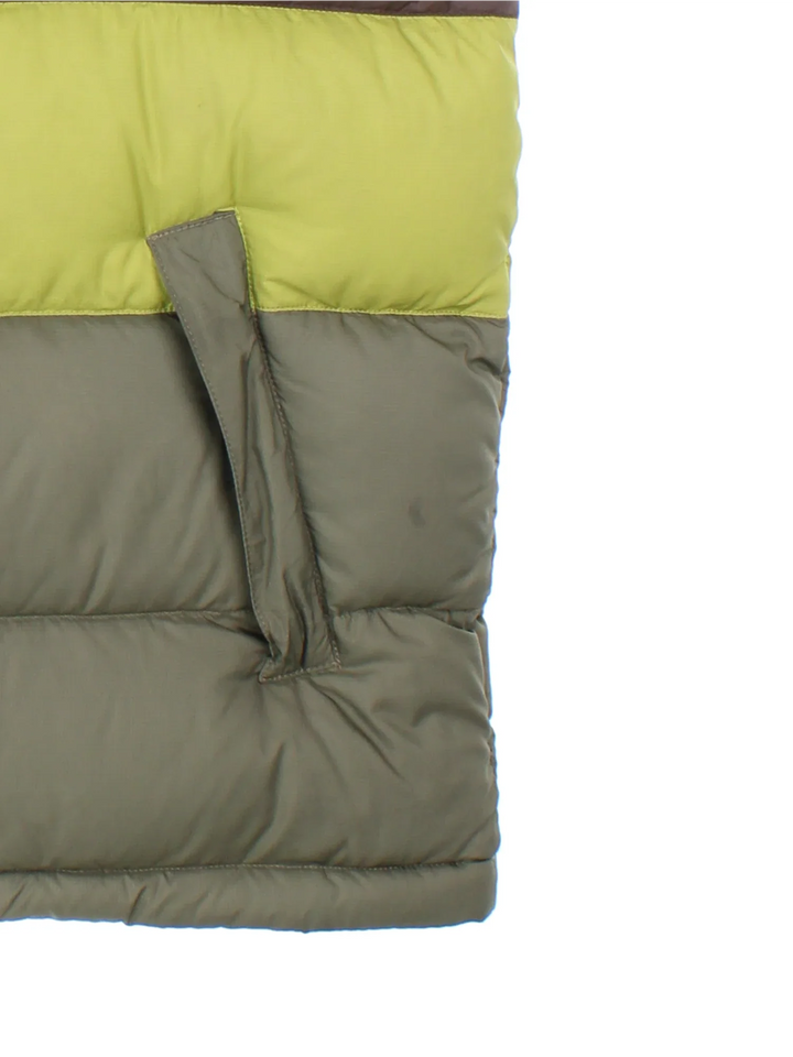 The North Face 700 Gilet in a green colourway with tonal stripe panelling, two pockets, full zip and small classic logo on the front.