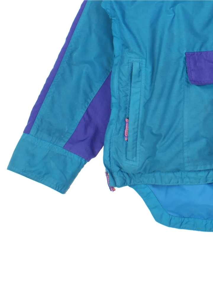 Vintage 90's Columbia Jacket in a blue colourway with retro tonal panelling. Half zip with large pocket on the front and two zip side pockets. Small logo on the chest.