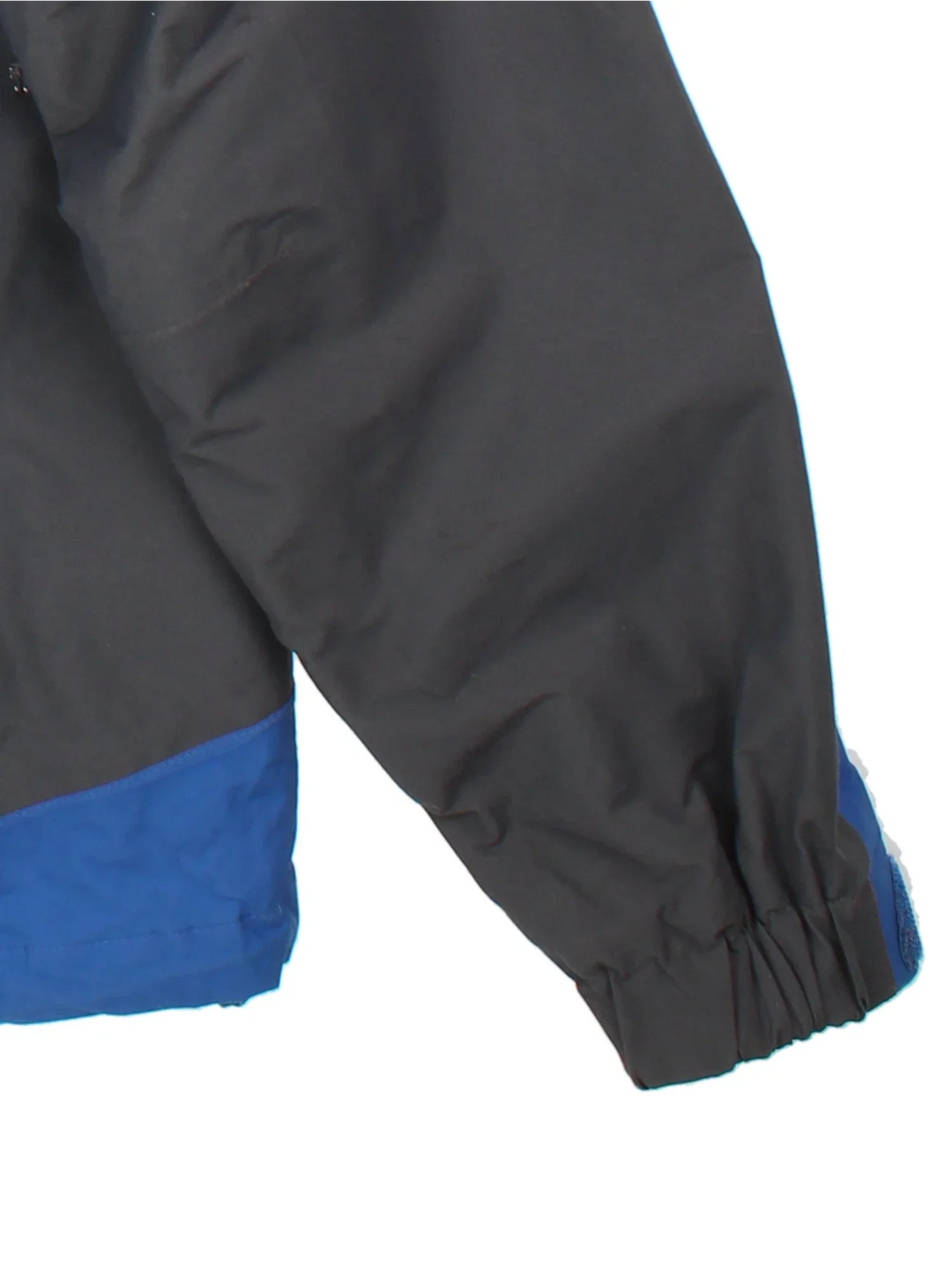 The North Face Hyvent Jacket in a blue colourway with black panelling. Full zip with multiple pockets, drawstring hood and hem with small classic logo on the chest.