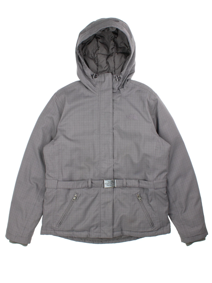 The North Face Hyvent Jacket in a grey colourway. Goose down lining full zip and buckle waist. Multiple pockets on the front and drawstring hood with small classic logo on the chest and buckle.