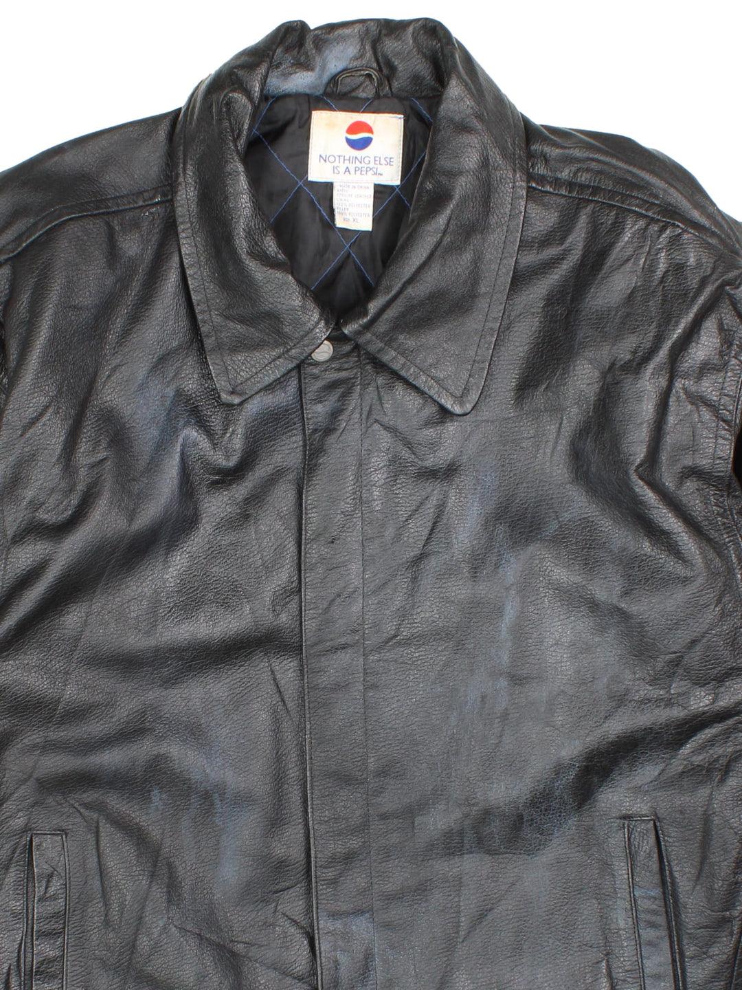 Vintage 90's Pepsi Leather Jacket in a black colourway. Full zip, pepsi logo detailing and two standard side pockets.