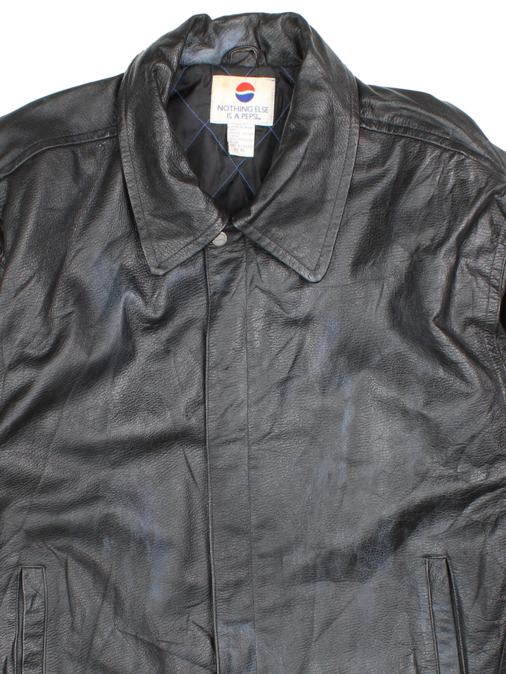 Vintage 90's Pepsi Leather Jacket in a black colourway. Full zip, pepsi logo detailing and two standard side pockets.
