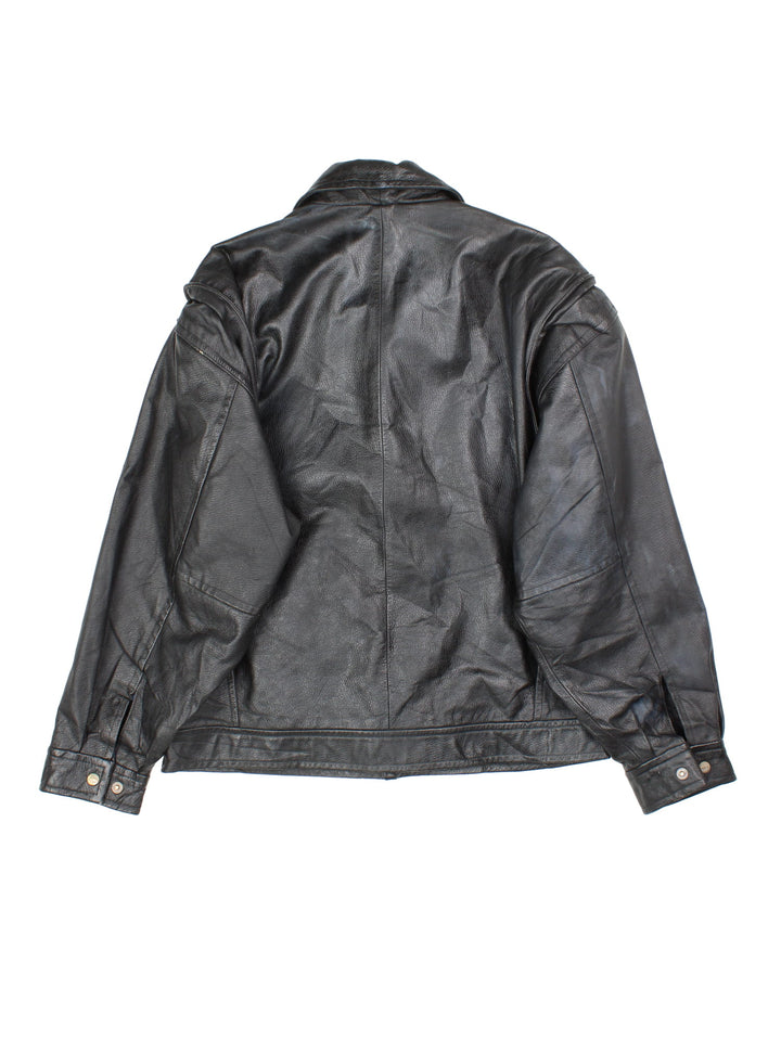 Vintage 90's Pepsi Leather Jacket in a black colourway. Full zip, pepsi logo detailing and two standard side pockets.