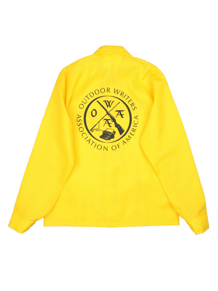 Vintage Outdoorsman Coaches Jacket in a yellow colourway. Buttons up and has side pockets, small logo on the front and larger graphic on the back.