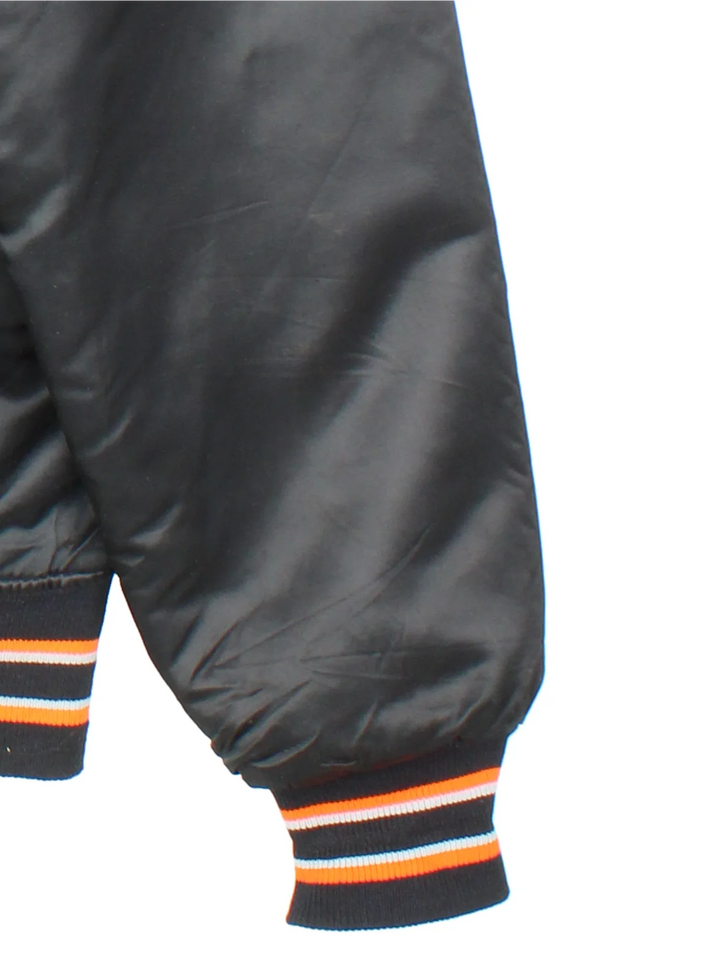 Vintage Starter San Francisco Giants Bomber Jacket in a black colourway with orange and grey detailing. Buttons up and has side pockets, quilted lining, and has the logos embroidered on the front.
