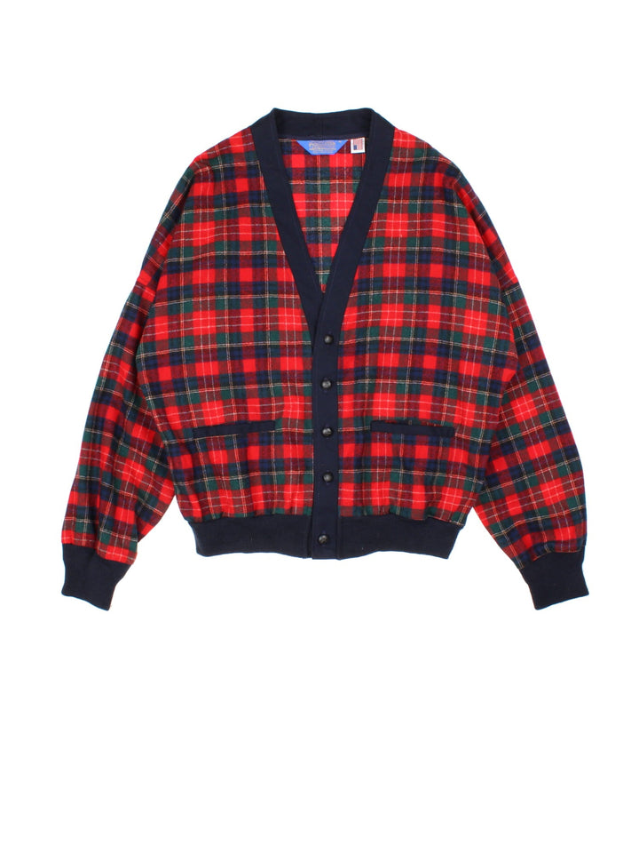 Vintage Pendleton Plaid Wool Cardigan in a red patterned colourway. Buttons up and has double front pockets, and a big collar.