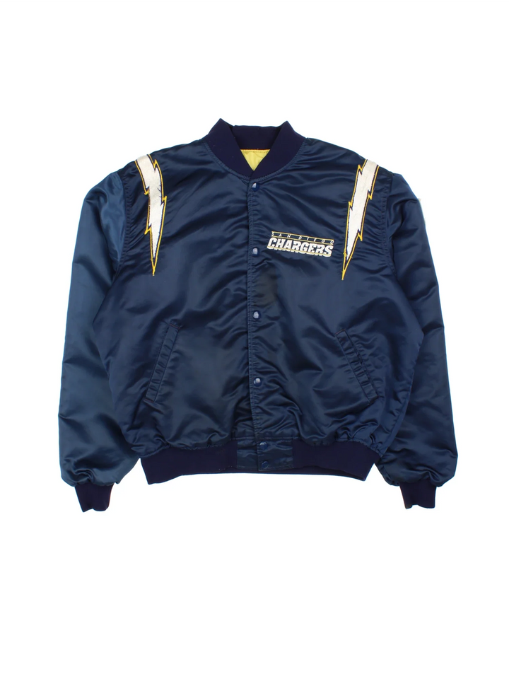 Vintage Starter San Diego Varsity Jacket in a blue colourway. Buttons up and has side pockets, has logos embroidered on the front/back and sleeve.