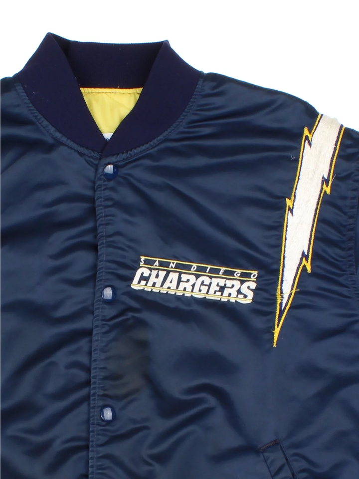 Vintage Starter San Diego Varsity Jacket in a blue colourway. Buttons up and has side pockets, has logos embroidered on the front/back and sleeve.