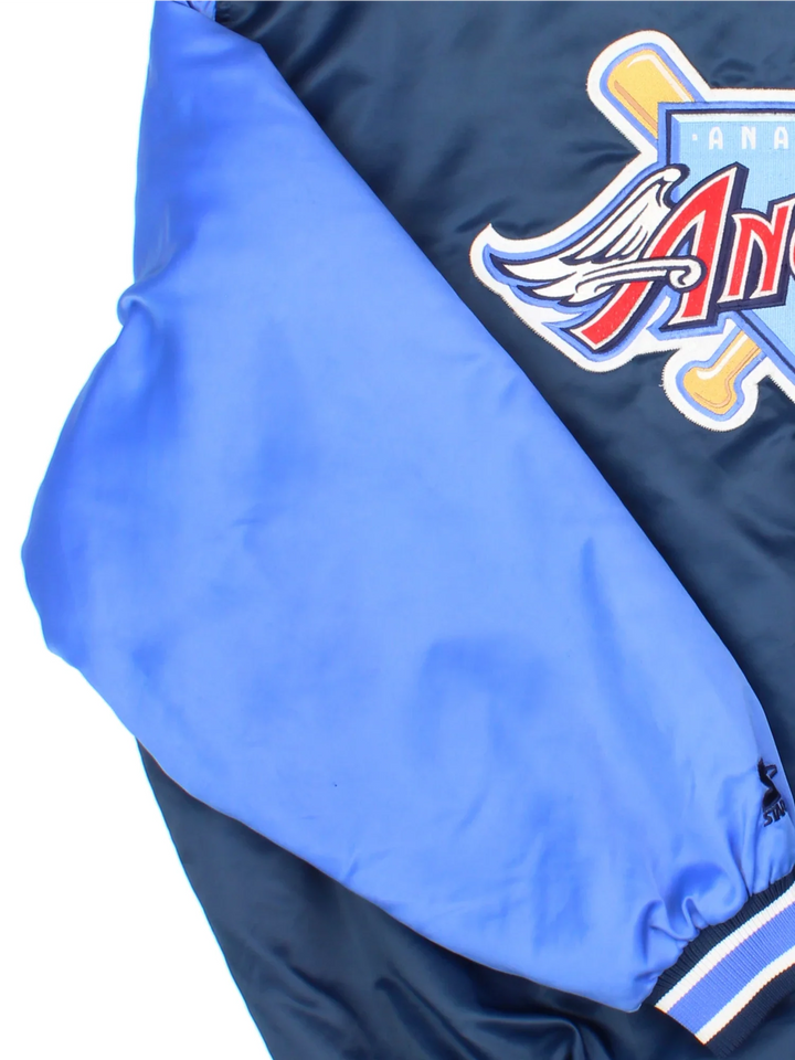 Vintage Starter Anahiem Angels Varsity Jacket in a blue colourway. Buttons up and has side pockets, contrast cuffs and hem has logos embroidered on the front and back.
