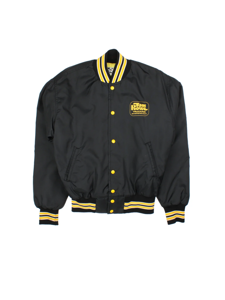 Vintage Tom Rowe Varsity Jacket in a black/yellow colourway. Buttons up and has side pockets, contrast cuffs and hem has logos printed on the front and back.