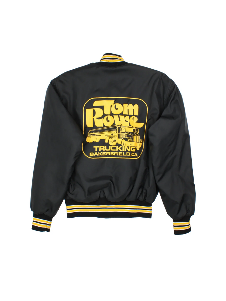 Vintage Tom Rowe Varsity Jacket in a black/yellow colourway. Buttons up and has side pockets, contrast cuffs and hem has logos printed on the front and back.