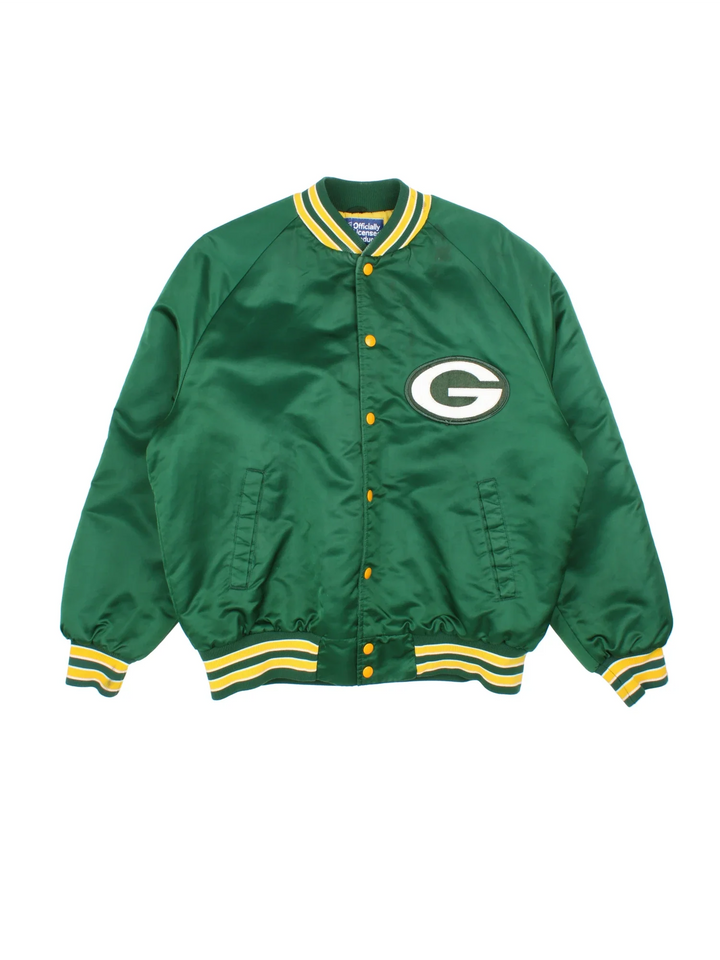 NFL Green Bay Packers Varsity Jacket in a green/yellow colourway. Buttons up with side pockets, contrast cuffs and hem. Logos embroidered on front and back.