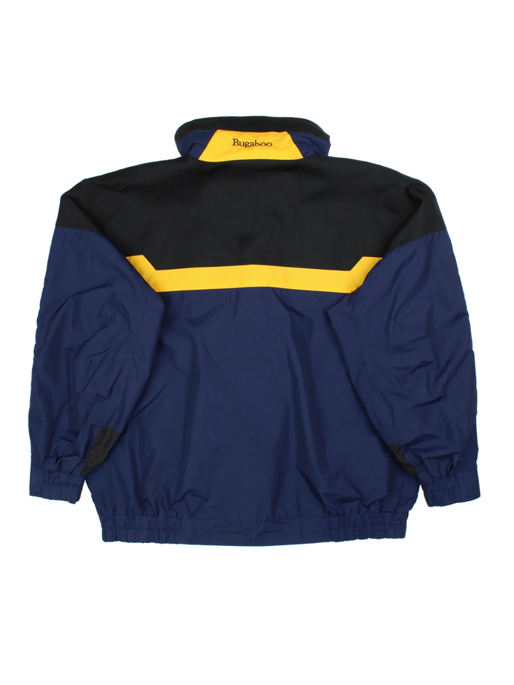90's Columbia Bugaboo Jacket in a blue colourway with yellow and black panelling. Full button and zip up front with multiple pockets, high collar with small logo on the chest.