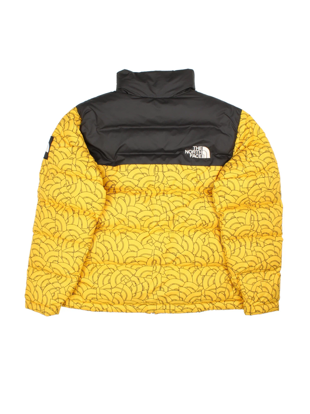 The North Face 92 Nuptse Jacket in a yellow colourway with black panelling on the shoulders and aztec patterning all over. Small classic logo on the sleeve and bakc.