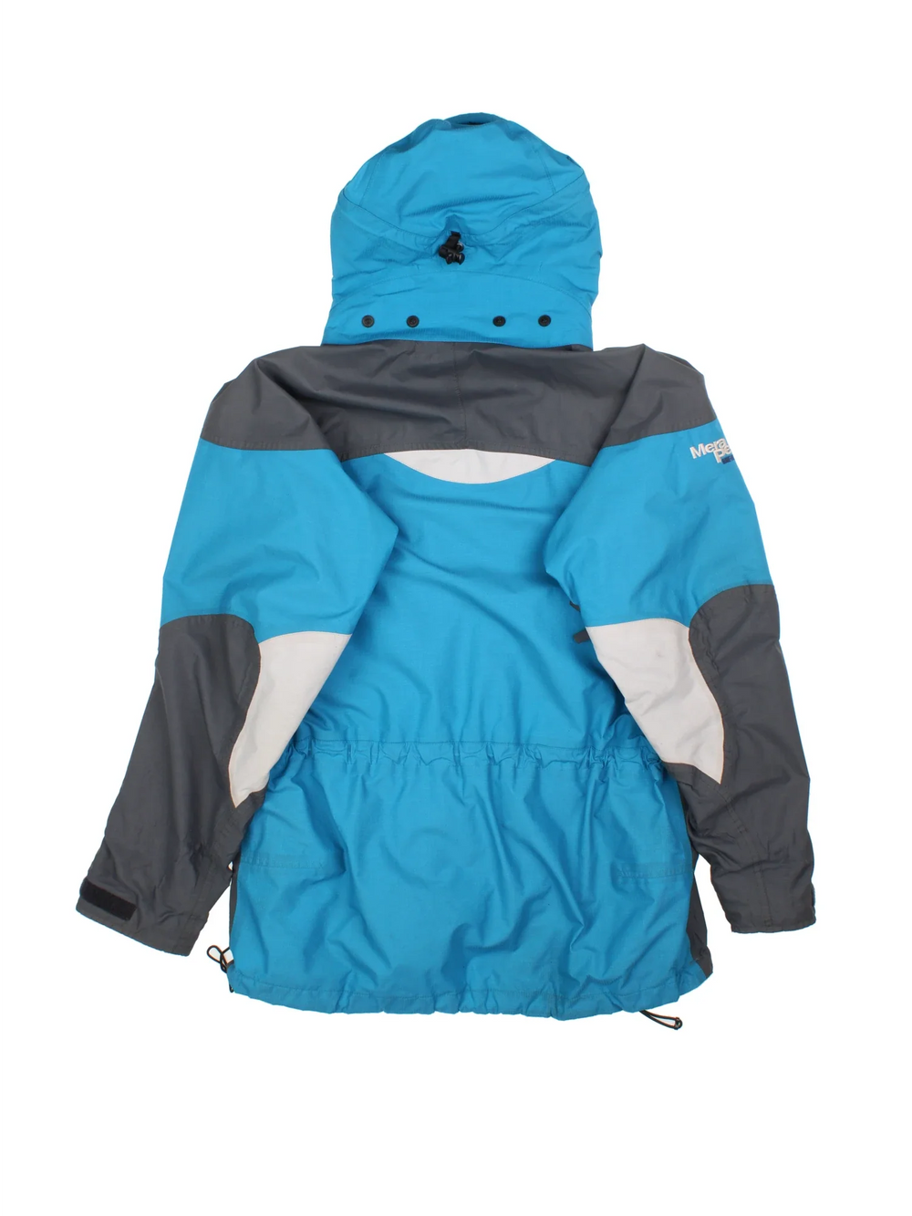 Vintage Berghaus Mera Peak Jacket in a blue colourway with grey tonal panelling. Full button and zip up front with multiple pockets, drawstring hood and small logo on the front.