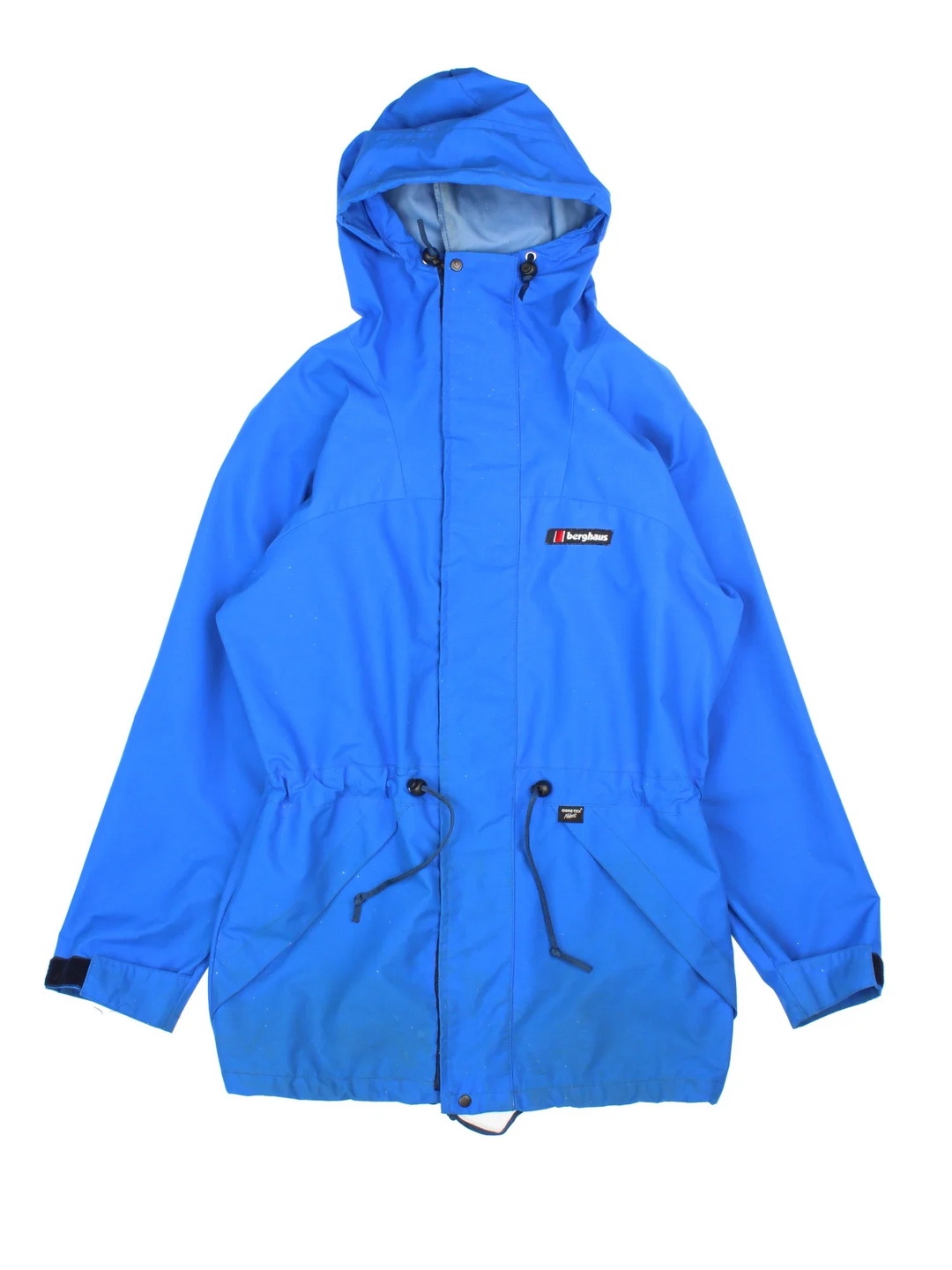 Berghaus Lightning Gore-Tex Jacket in a blue colourway. Full button and zip up front with multiple pockets, drawstring hood and small logo on the front.