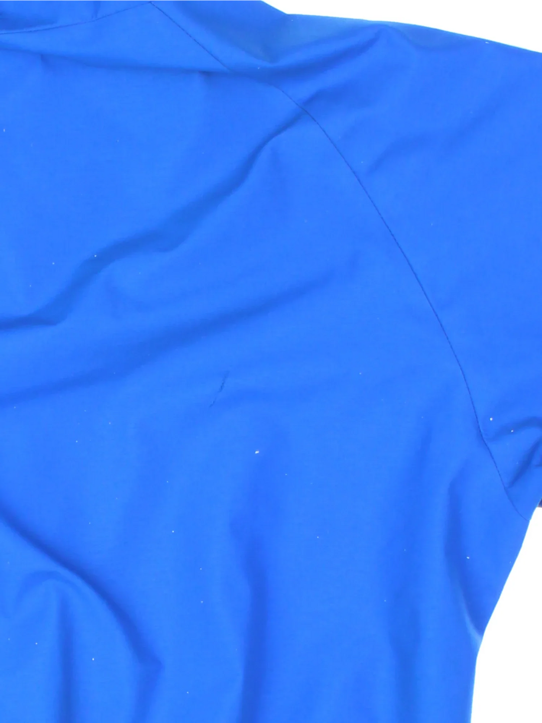 Berghaus Lightning Gore-Tex Jacket in a blue colourway. Full button and zip up front with multiple pockets, drawstring hood and small logo on the front.