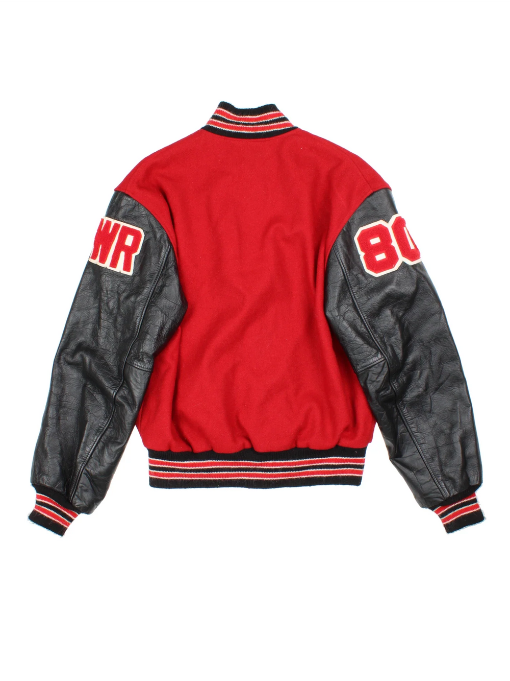 Vintage 80's Varsity Jacket in a red/black colourway. Buttons up, with contrast leather sleeves, elasticated hems/cuffs with embroidered detailing.
