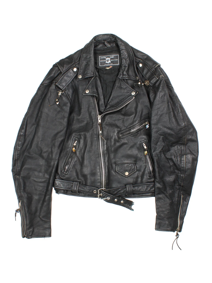 Vintage Beaded Leather Biker Jacket in a black colourway. Zip fastening, multiple pockets, motorcycle detailing and beaded detail on zippers.