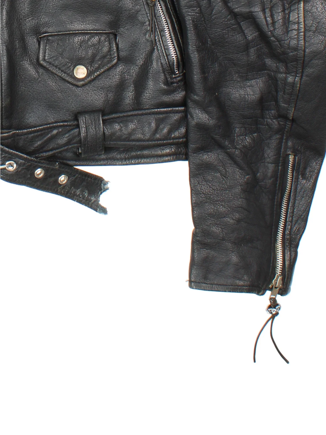 Vintage Beaded Leather Biker Jacket in a black colourway. Zip fastening, multiple pockets, motorcycle detailing and beaded detail on zippers.