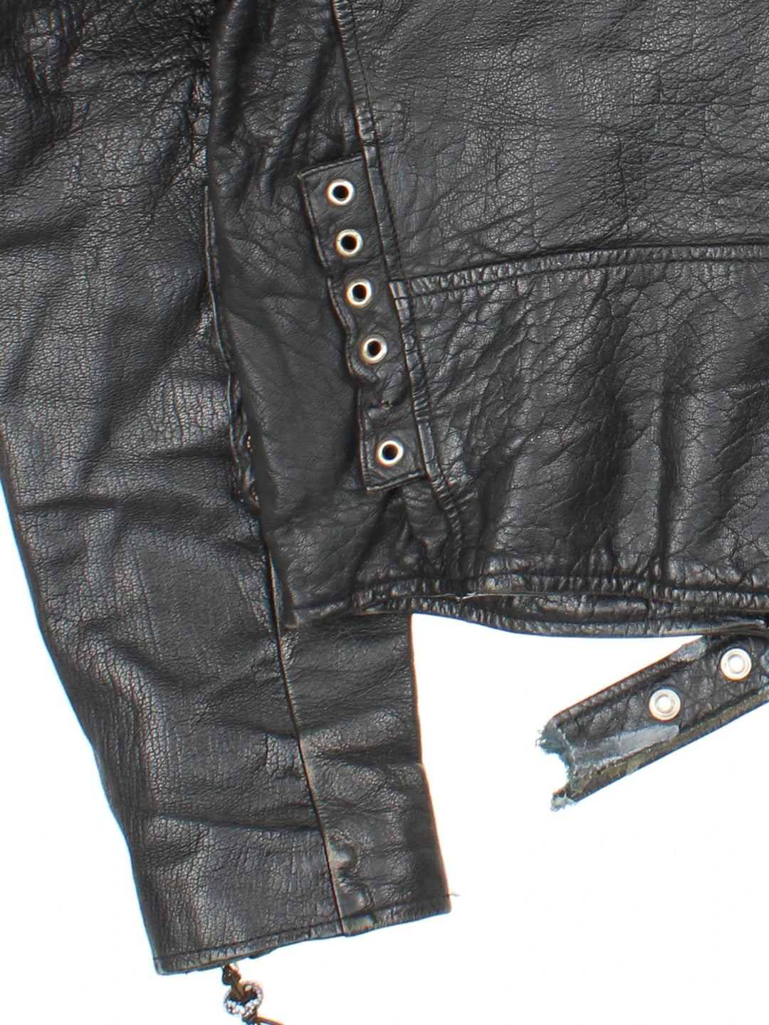 Vintage Beaded Leather Biker Jacket in a black colourway. Zip fastening, multiple pockets, motorcycle detailing and beaded detail on zippers.
