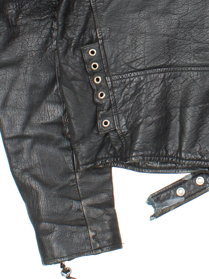 Vintage Beaded Leather Biker Jacket in a black colourway. Zip fastening, multiple pockets, motorcycle detailing and beaded detail on zippers.